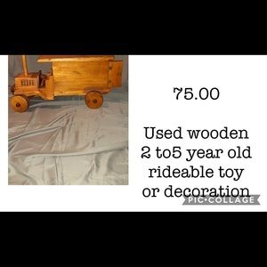 Wooden rideable toddler truck.
